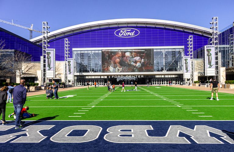 A lively scene at the Ford Center sports venue with people enjoying the outdoors.