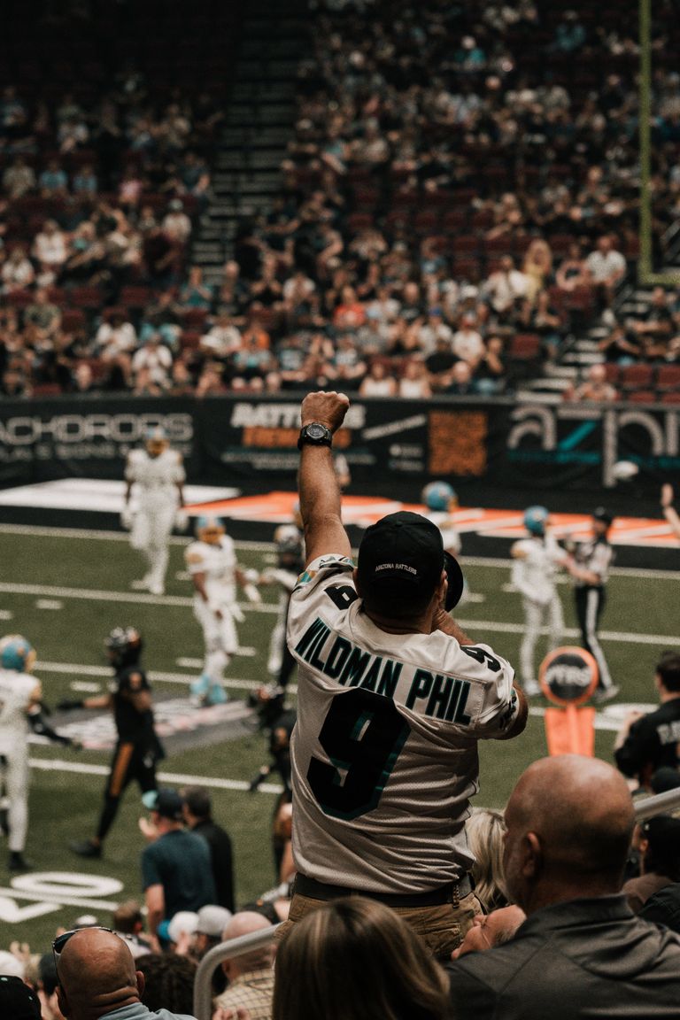 Excited fan cheering during an American football match in Glendale, Arizona.