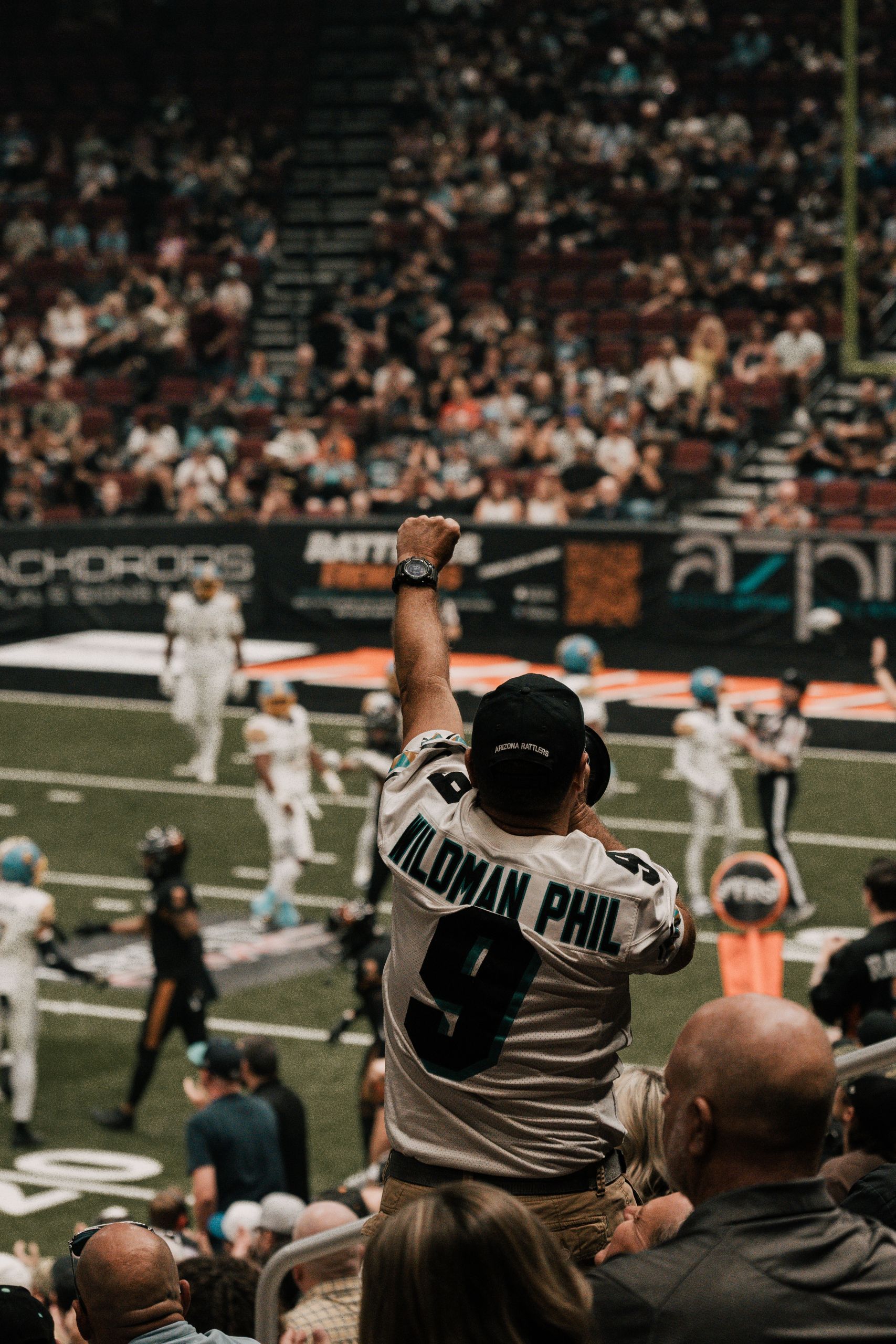 Excited fan cheering during an American football match in Glendale, Arizona.