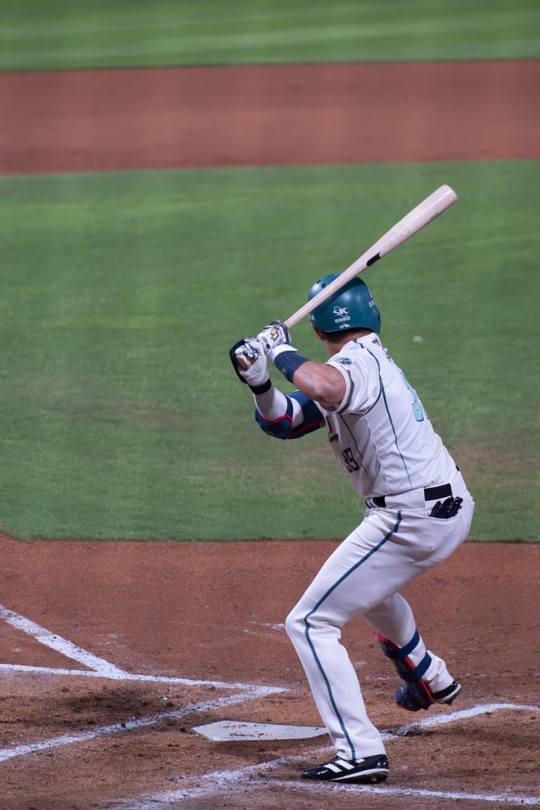 Baseball player preparing to bat at a sports event in Taipei, Taiwan.