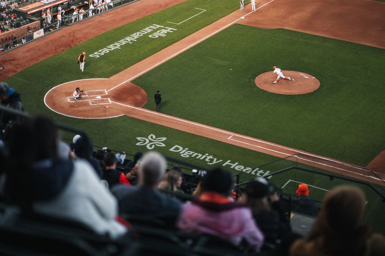 Aerial view of a baseball game at Oracle Park in San Francisco, showcasing exciting action on the field.