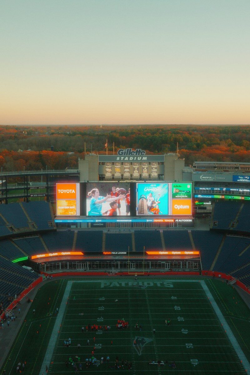 Gillette stadium with a football field below
